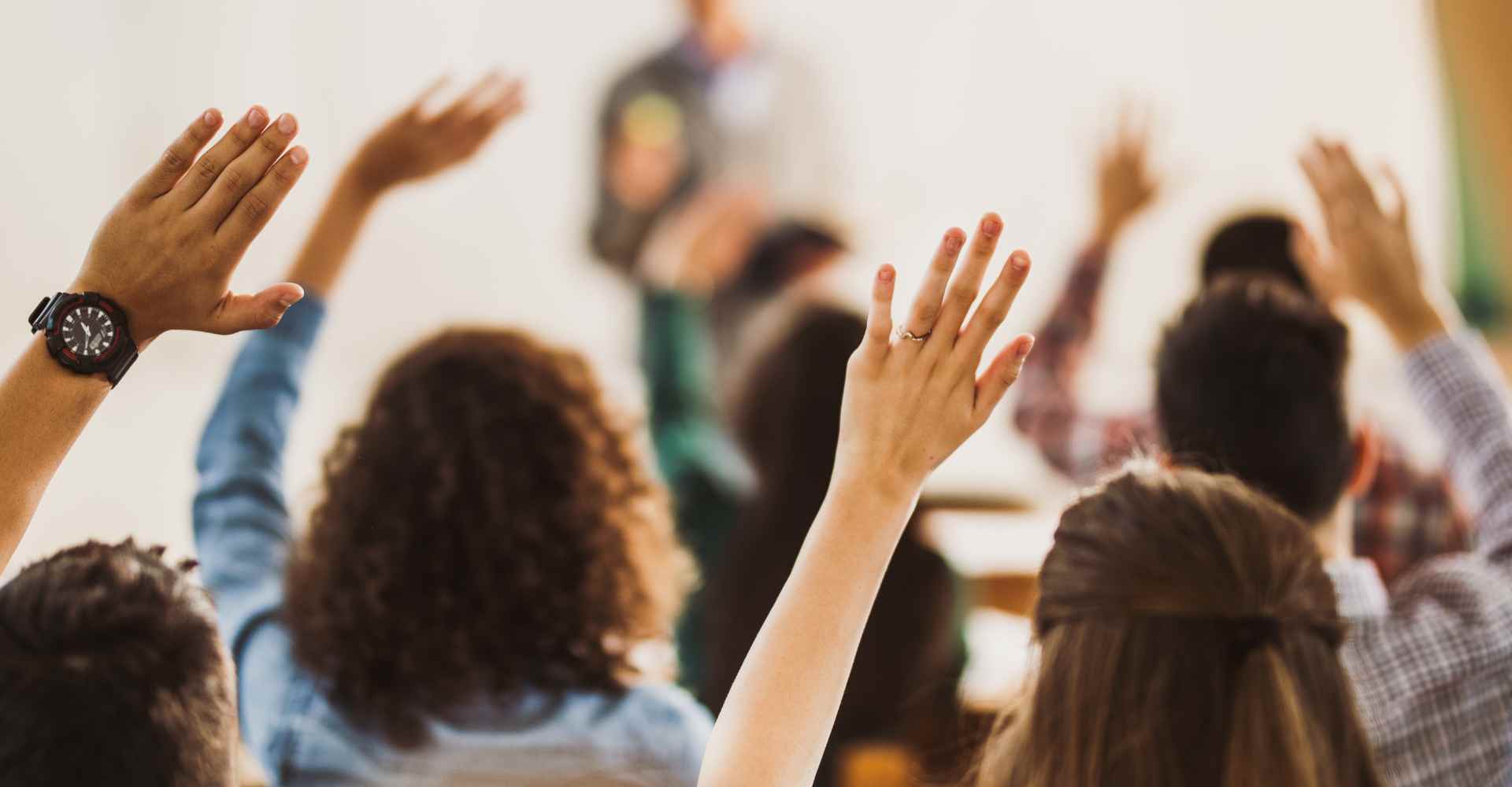 Group of raised hands