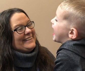 OhioGuidestone Joyful Together staff member inspiring joy in her client through a Joyful Together activity.